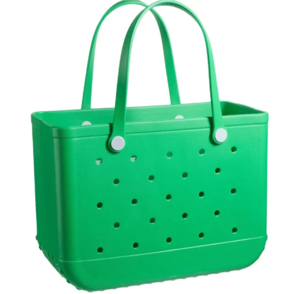 Green perforated tote sample documented for custom handbag manufacturing review
