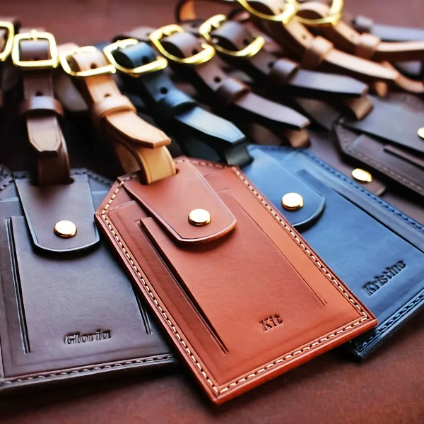 Leather luggage tag samples arranged for custom handbag manufacturing review
