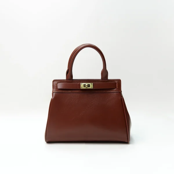 Brown structured handbag sample for custom handbag manufacturing with top handle