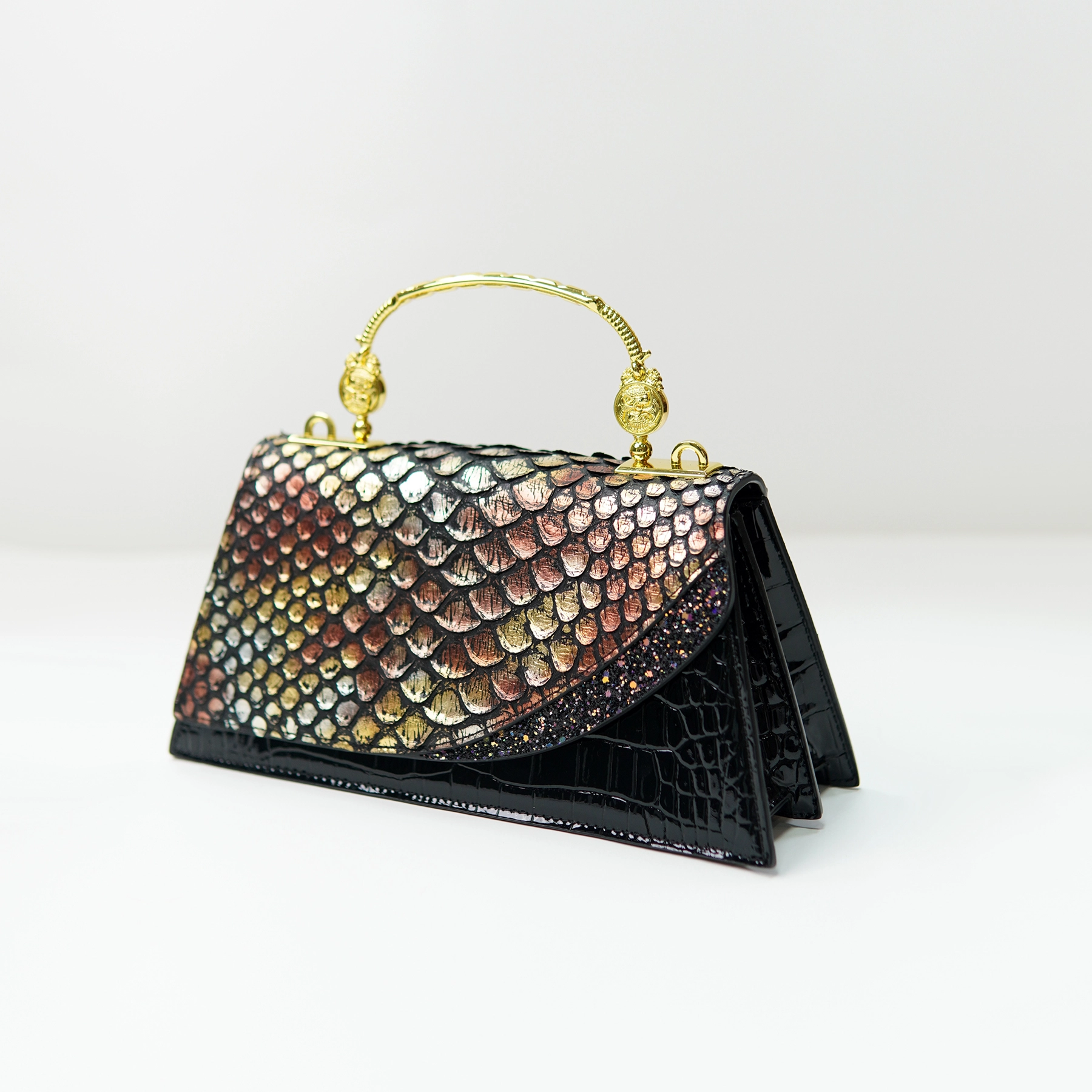 Structured handbag sample with scale-pattern flap for OEM/ODM contract manufacturing review