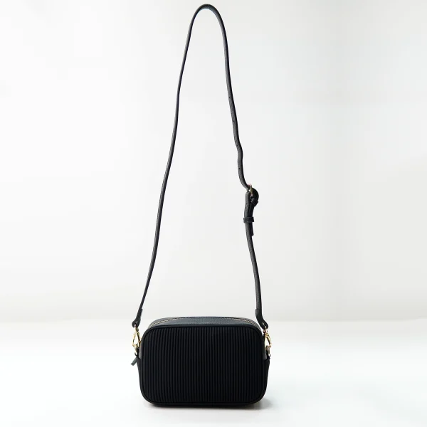 Black crossbody handbag sample with adjustable strap for custom handbag manufacturing