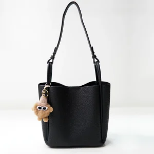 Black pebbled handbag sample documented for private label handbag production review