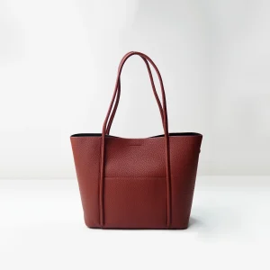 Pebbled leather tote bag sample for custom handbag manufacturing review