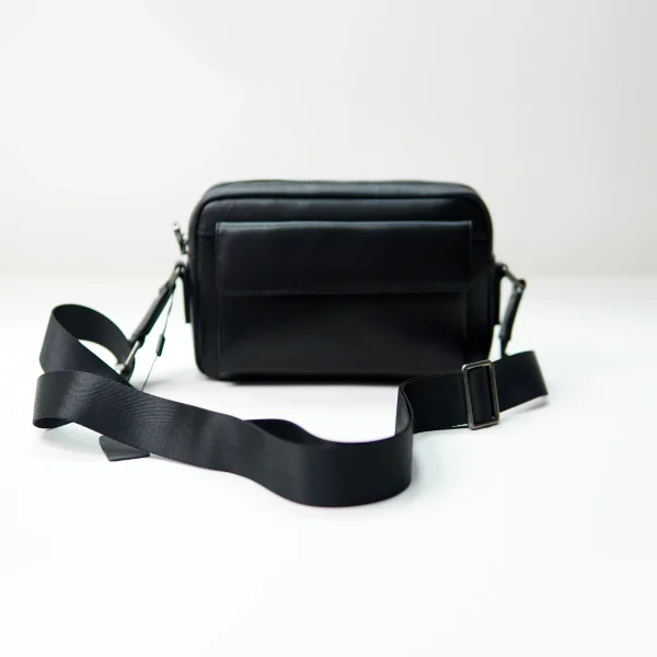Black crossbody bag sample for custom handbag manufacturing review