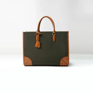 Structured canvas tote with leather trim for custom handbag manufacturing review