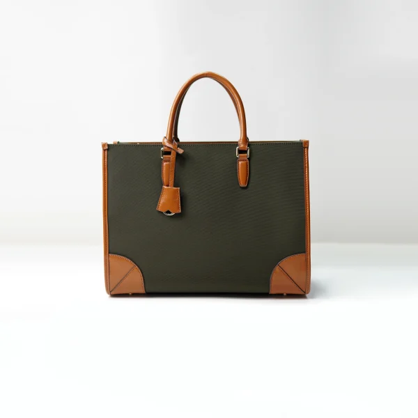 Structured canvas tote with leather trim for custom handbag manufacturing review