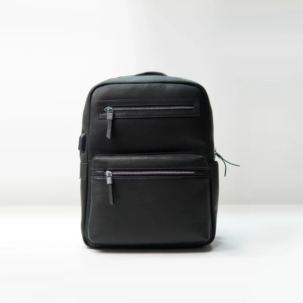 Black leather backpack sample for custom handbag manufacturing review