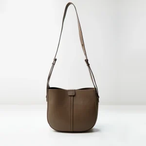 Brown shoulder bag sample documented for custom handbag manufacturing review
