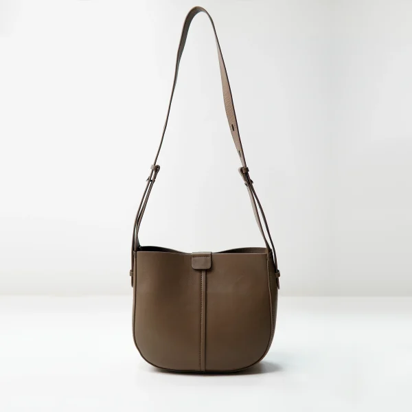 Brown shoulder bag sample documented for custom handbag manufacturing review