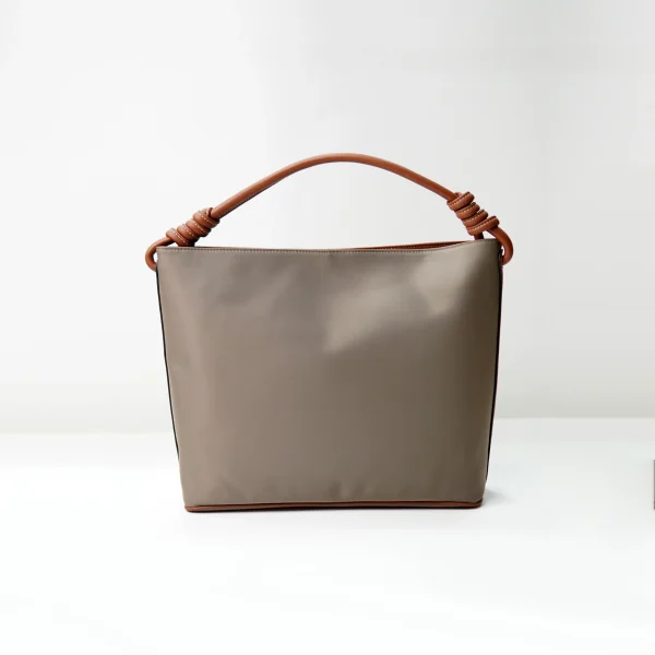 Structured tote handbag sample for custom handbag manufacturing review