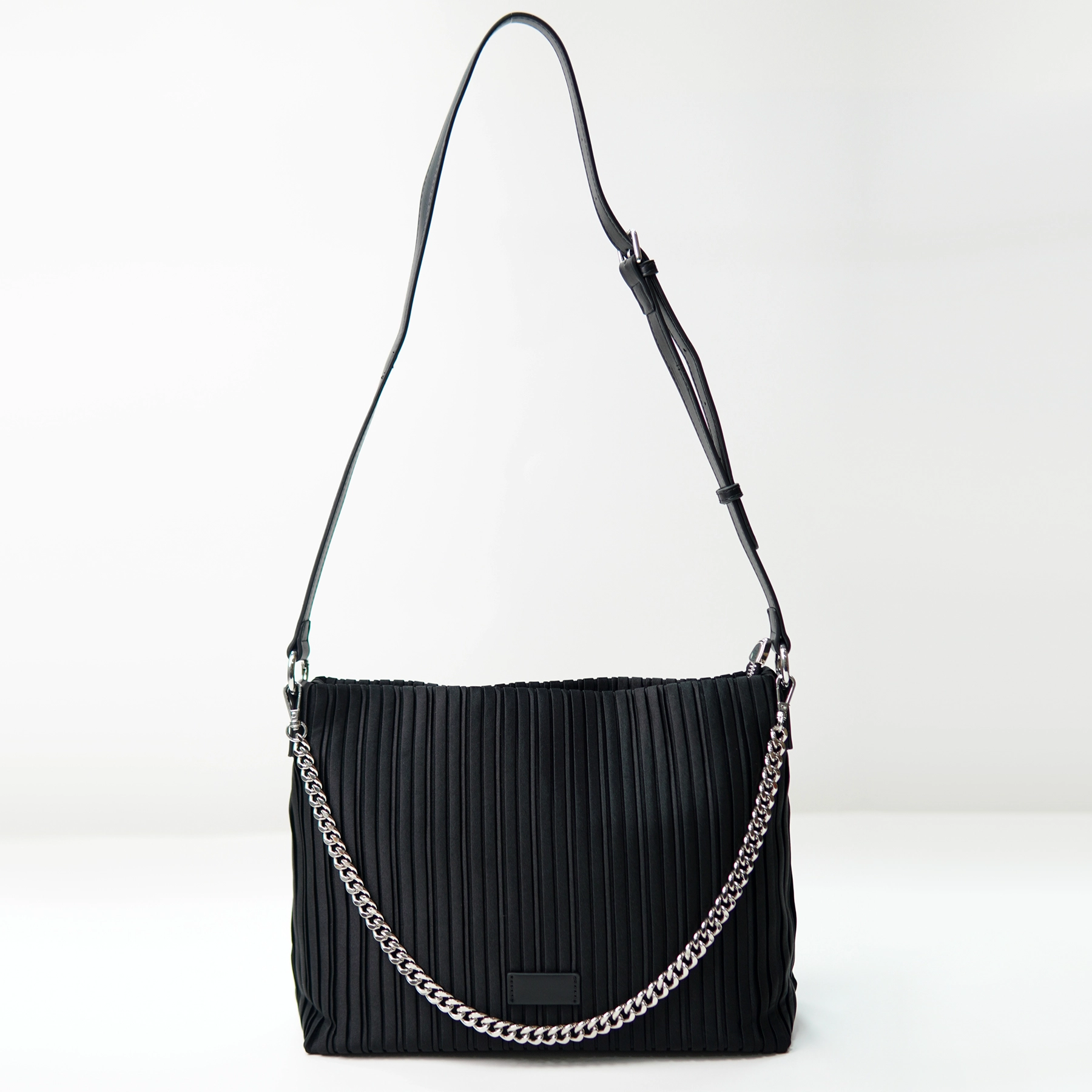 Pleated black shoulder bag sample for private label handbag production review