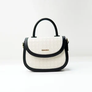 Structured mini handbag sample for private label handbag production review