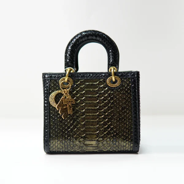 Structured snakeskin-pattern handbag sample for private label handbag production review