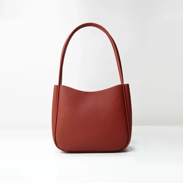 Pebbled leather tote sample for custom handbag manufacturing review