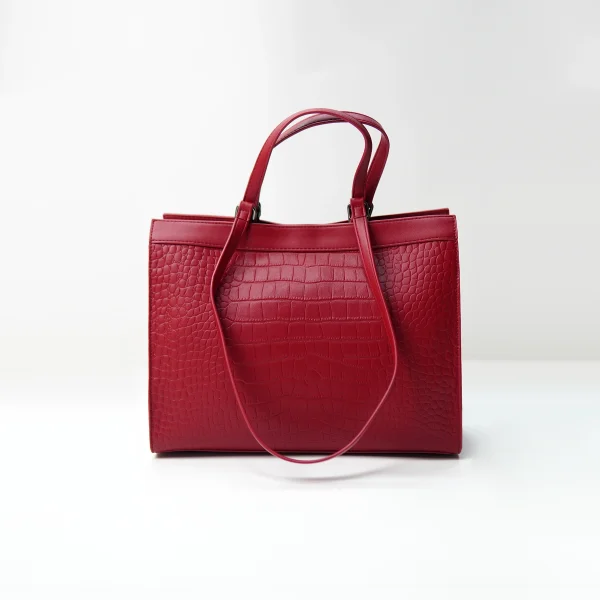 Red embossed leather tote sample for custom handbag manufacturing review