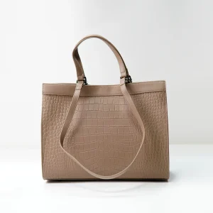 Embossed leather tote sample for custom handbag manufacturing review