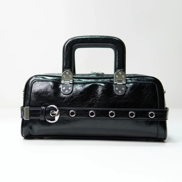Black structured handbag sample for custom handbag manufacturing hardware review