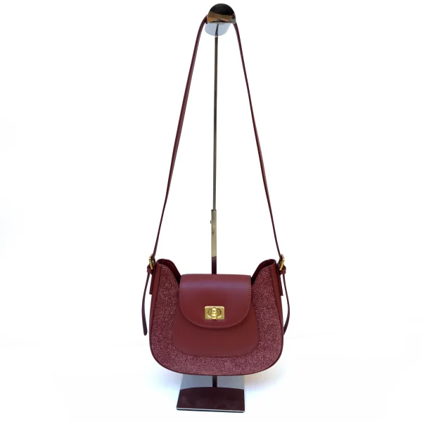 Burgundy shoulder bag sample documented for custom handbag manufacturing review