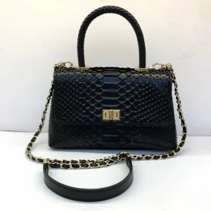 Black textured handbag sample with chain strap for custom handbag manufacturing