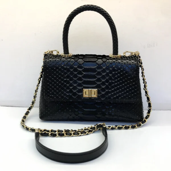 Black textured handbag sample with chain strap for custom handbag manufacturing
