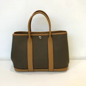 Custom handbag manufacturer tote sample with canvas body and leather trim
