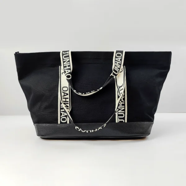 Black fabric tote bag sample for private label handbag production review