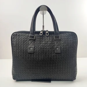 Woven black leather briefcase sample for custom handbag manufacturing review