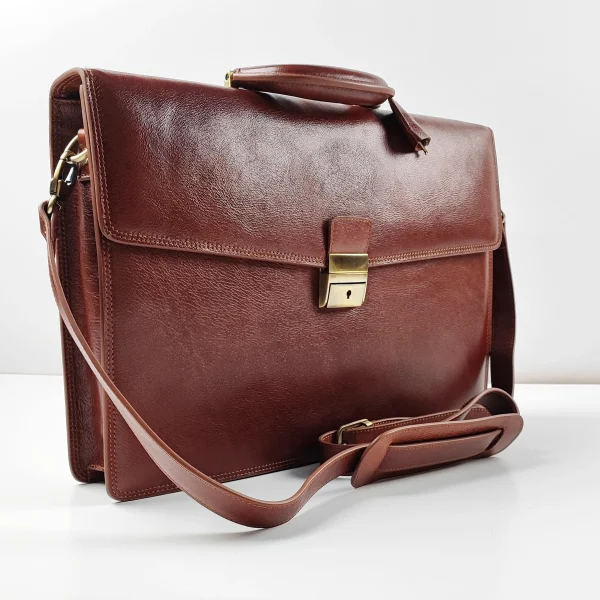 Brown leather briefcase sample for custom handbag manufacturing specification review