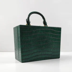 Green crocodile-embossed box handbag sample for custom handbag manufacturing review