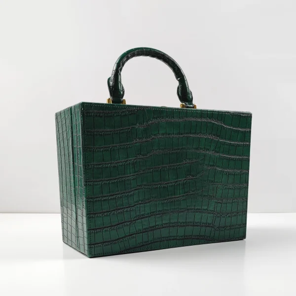 Green crocodile-embossed box handbag sample for custom handbag manufacturing review