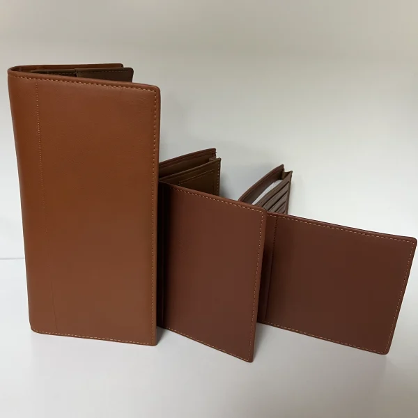 Brown wallet samples with stitched edges for private label handbag production review