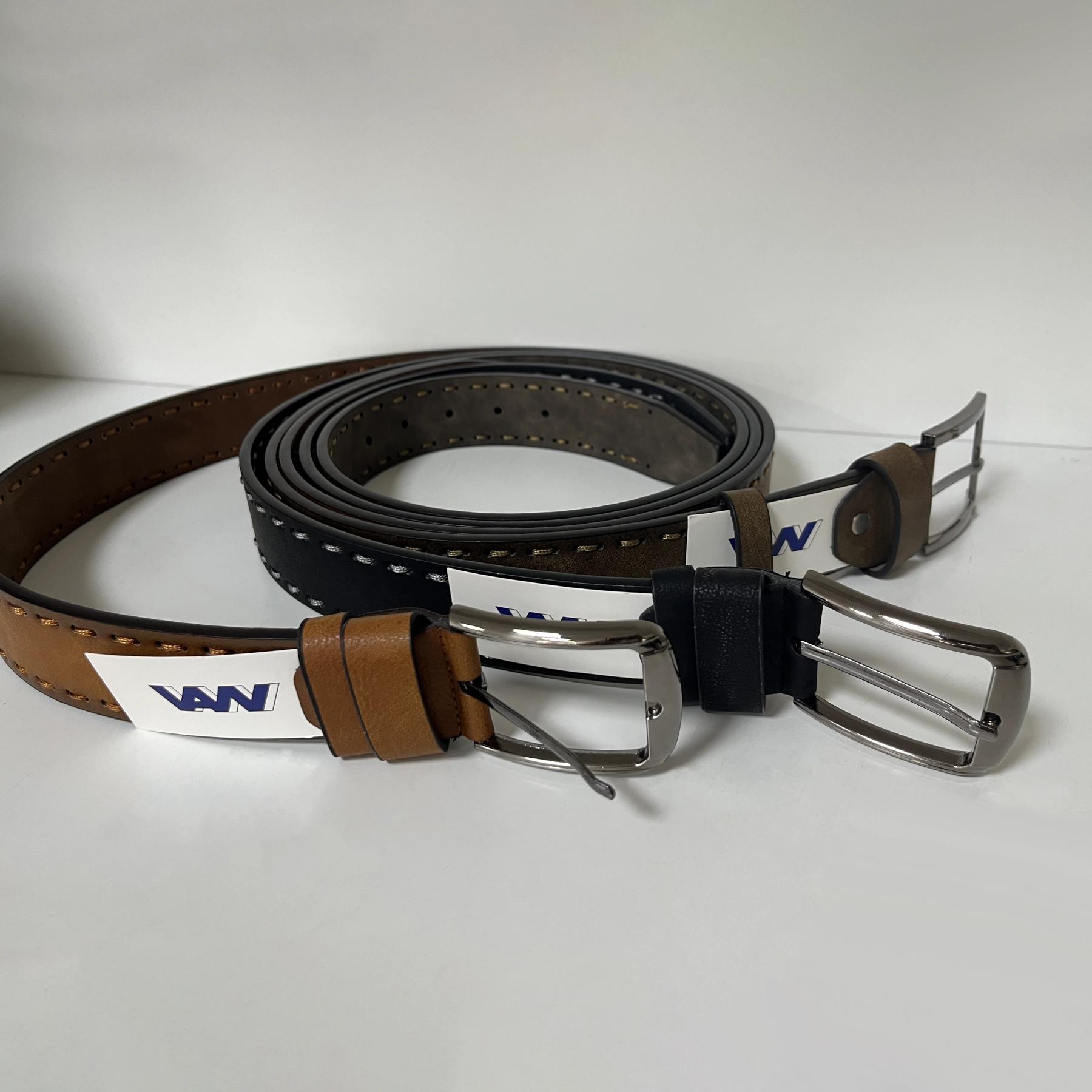 Belt samples with metal buckles for private label handbag production review