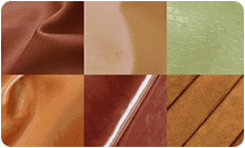 Leather material swatches arranged for custom handbag manufacturing selection review