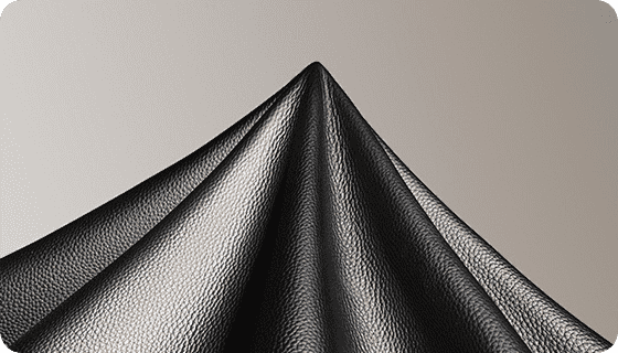 Black pebbled leather panel reference for custom handbag manufacturing material review