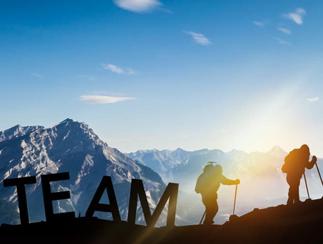 Team hiking silhouette used for custom handbag manufacturer corporate profile documentation