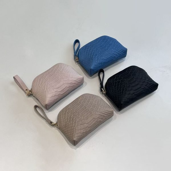 Embossed wristlet pouch samples for private label handbag production review