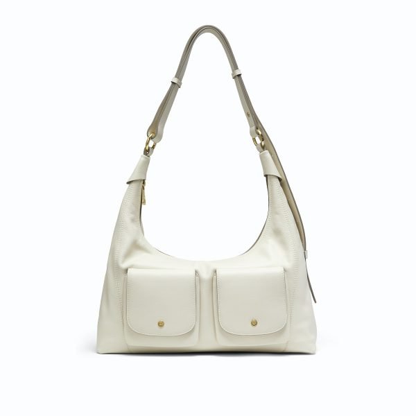 Custom handbag manufacturer reference showing cream shoulder bag with dual front pockets