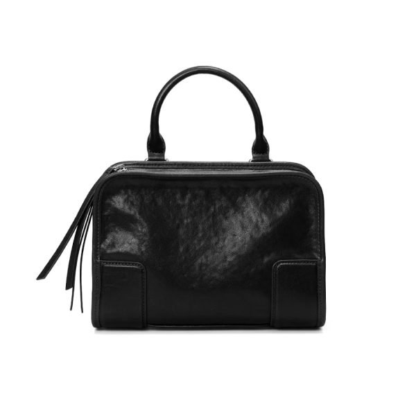 Black leather handbag sample documented for custom handbag manufacturing specification review