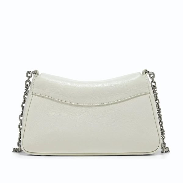 White textured shoulder bag sample for private label handbag production review