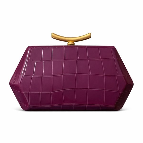 Structured clutch bag sample documented for custom handbag manufacturing specification review
