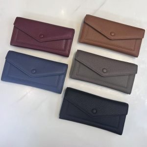 Pebbled leather wallet samples arranged for private label handbag production review