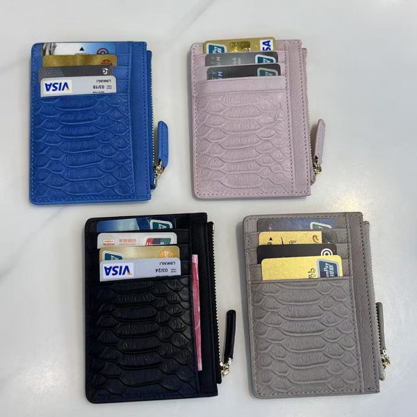 Embossed card wallet samples arranged for custom handbag manufacturing review