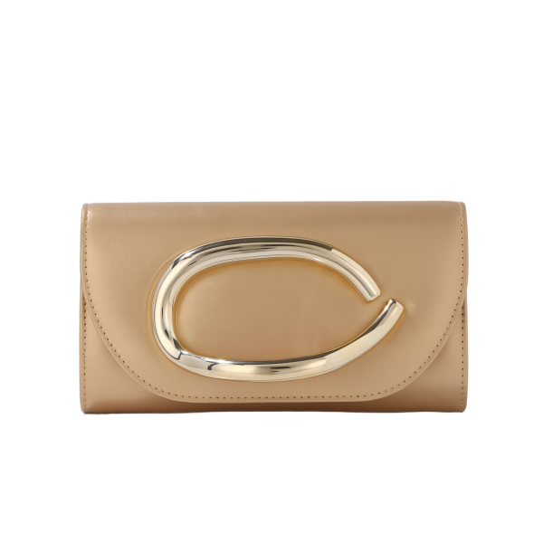 Custom handbag manufacturer sample with tan flap panel and oval metal hardware