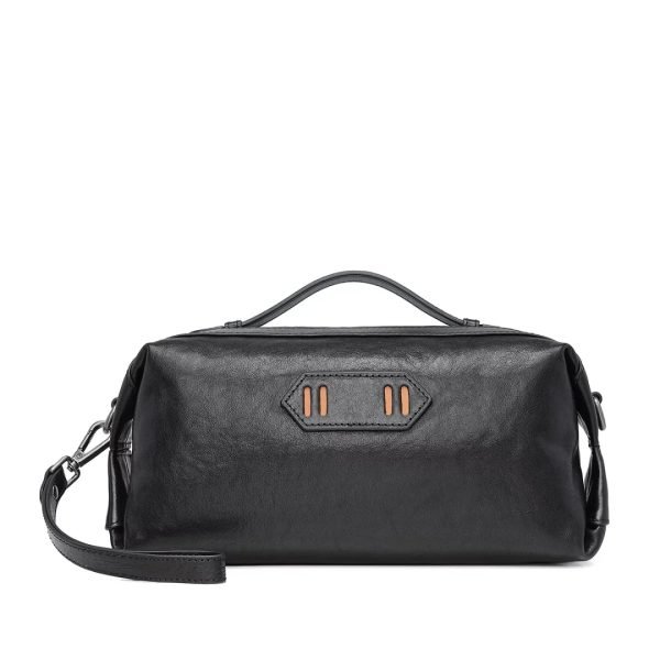 Black leather handbag sample documented for custom handbag manufacturing review