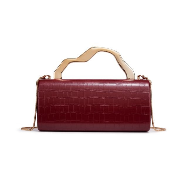 Croc-embossed red handbag sample for private label handbag production review