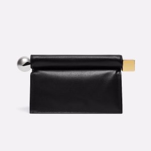 Black leather clutch sample with bar hardware for custom handbag manufacturing