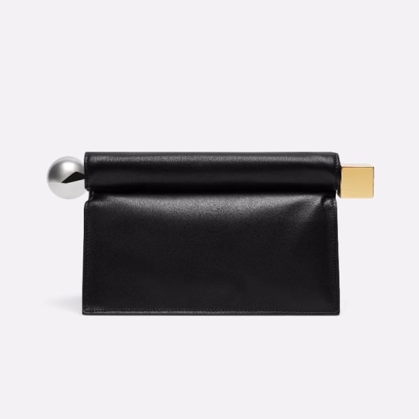 Black leather clutch sample with bar hardware for custom handbag manufacturing