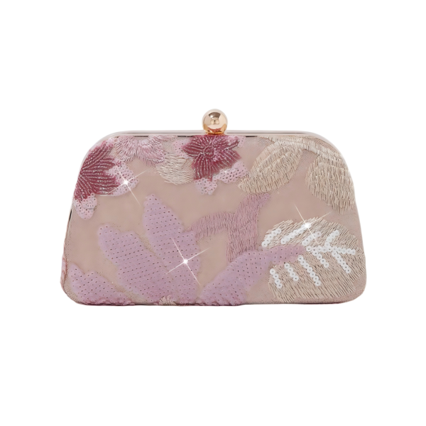 Custom handbag manufacturer documents embroidered clutch bag with metal frame closure