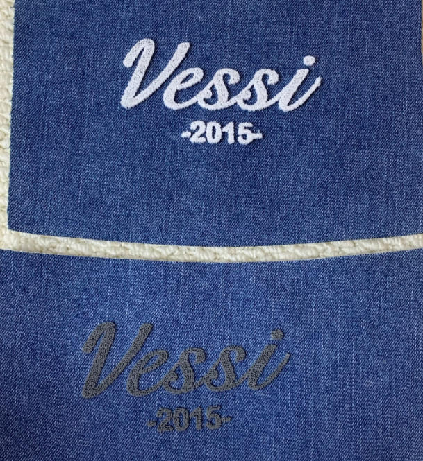 White and dark toothbrush embroidery logo samples tested on denim